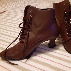 Brown Victorian ankle boots with a low heel